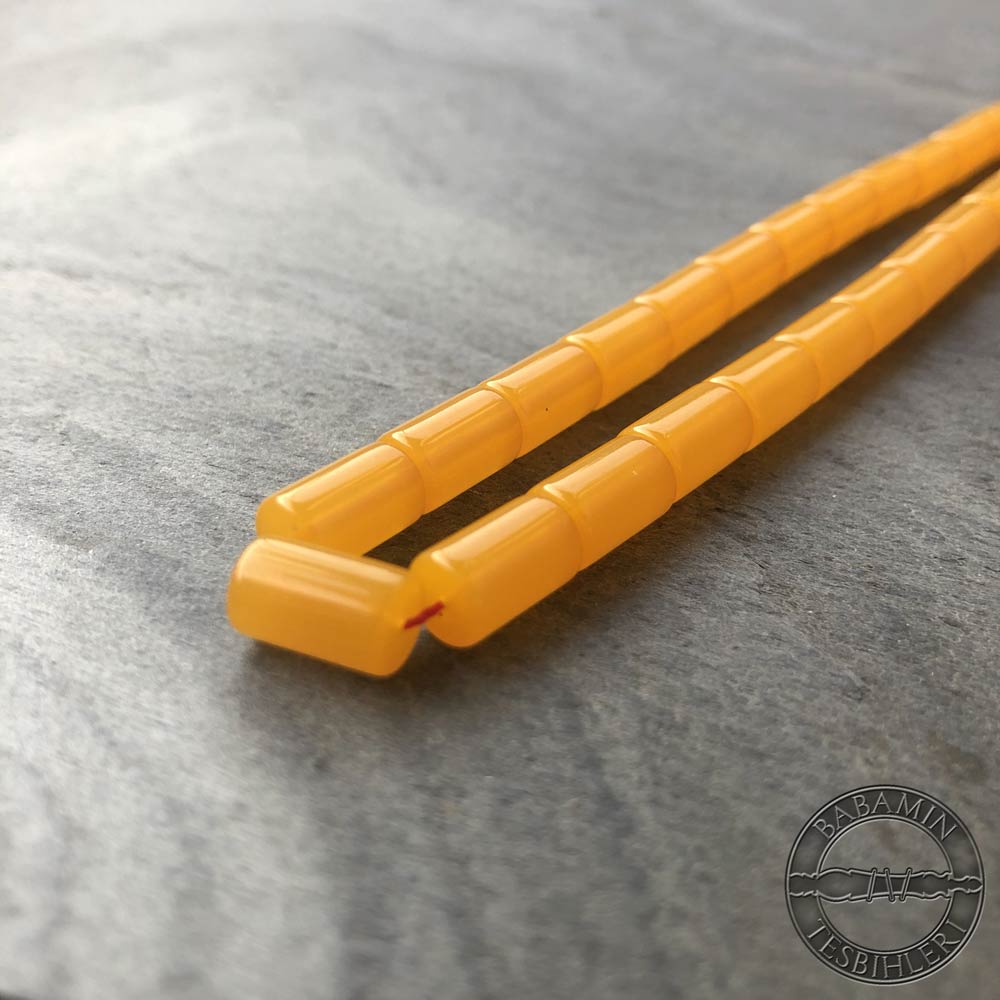 Buğulu sarı 6,5×10,5mm sıkma kehribar kesme model tesbih